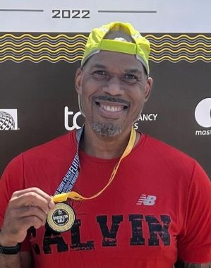 half-marathon | Sarcoidosis News | photo of Calvin Harris with his Brooklyn Half-Marathon medal