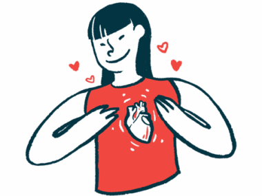 A person wearing a tank top with an anatomical image of a heart gestures toward it with both hands.