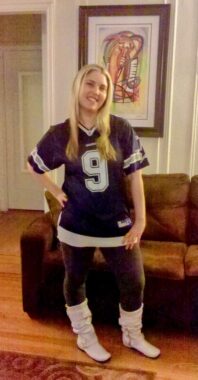 Photo of Kerry (thin and blonde) wearing a Tony Romo jersey, leggings, and boots.