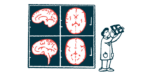 A medical professional looks at a brain scan.