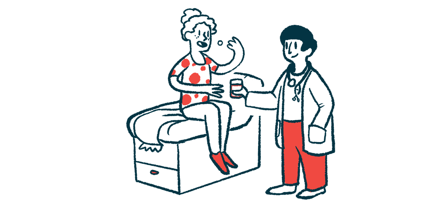 A doctor holds a cup of water as a patient seated on an examination table takes medicine.