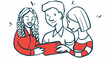 Three people have a discussion while viewing a tablet.